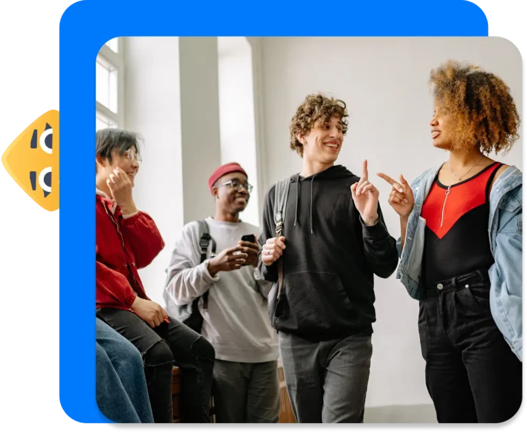 Students talking in the hallway with one another