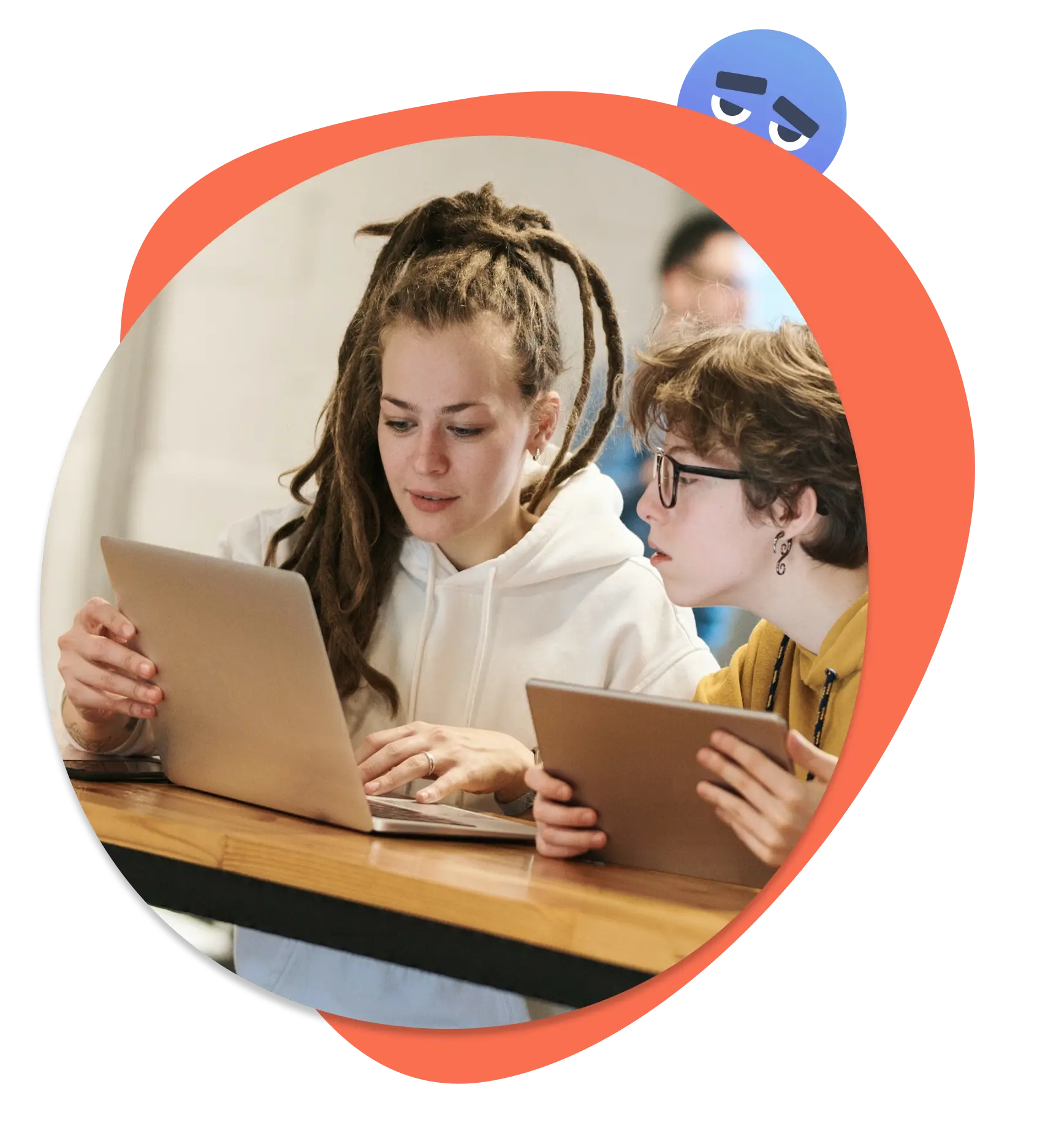 Two students working together on a response.